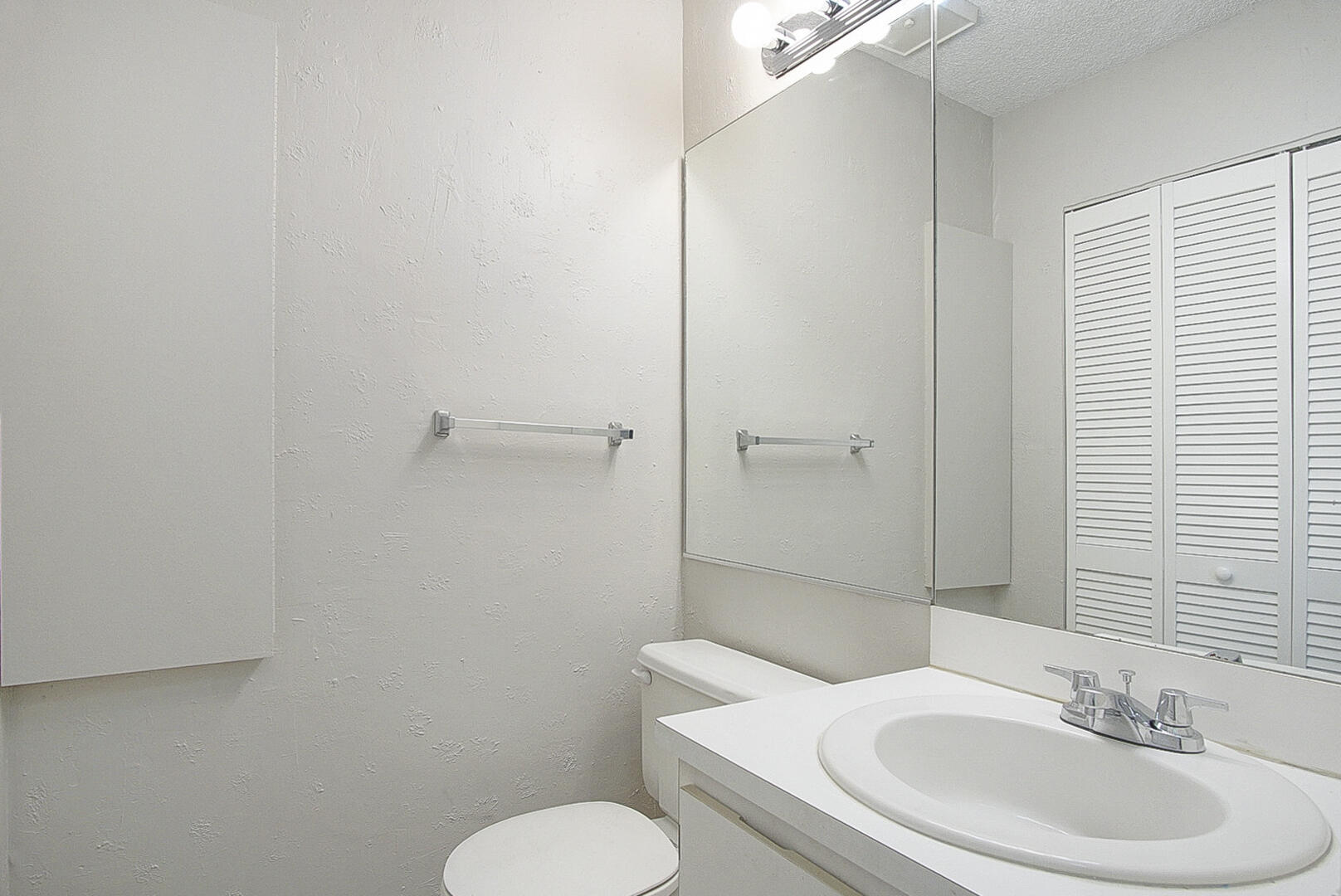 4206 Inlet Circle Greenacres, FL 33463 - Photo 9 of 30 a bathroom with a sink toilet and shower