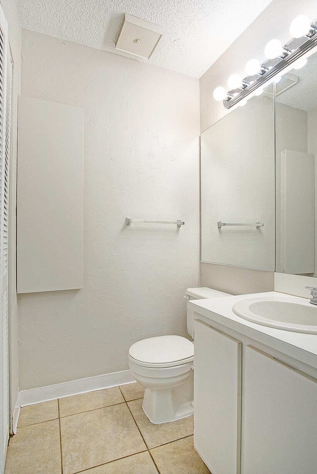 4206 Inlet Circle Greenacres, FL 33463 - Photo 10 of 30 a bathroom with a sink a toilet and shower