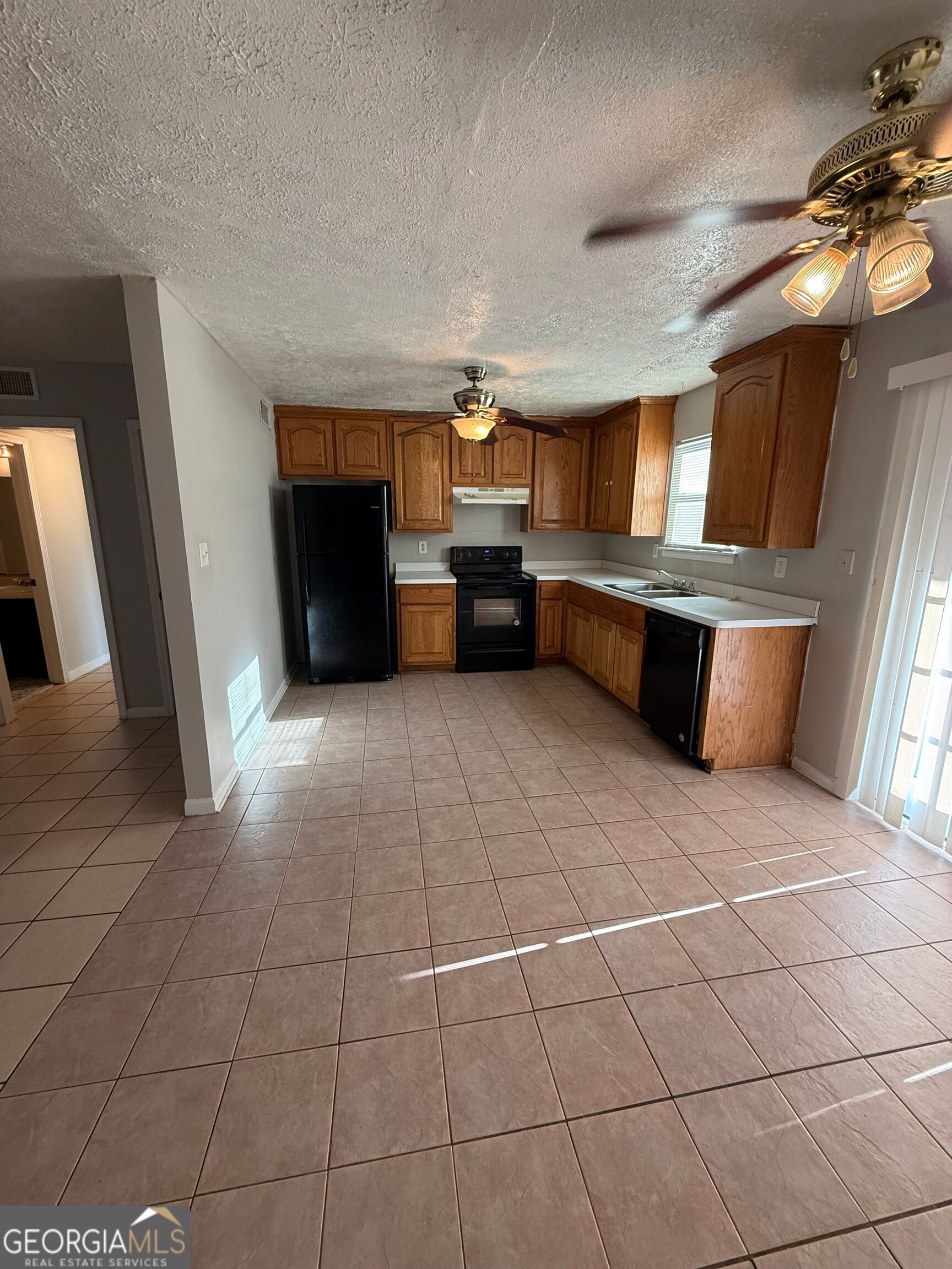 250 Toby Springs Lane McDonough, GA 30253 - Photo 5 of 10 a view of kitchen with furniture and window