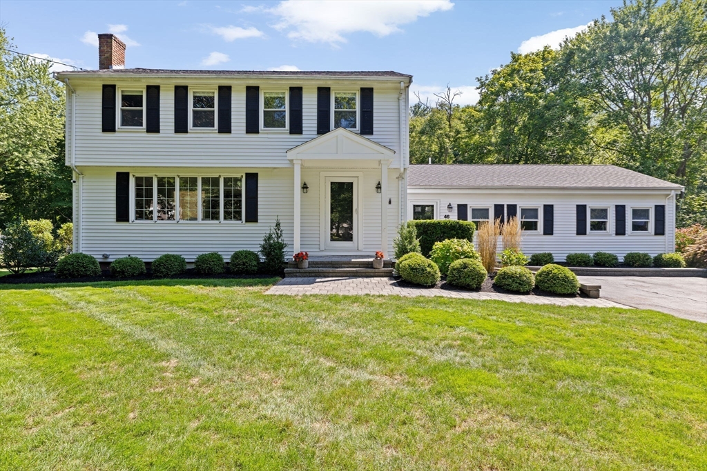 46 Brookwood Road Hanover, MA 02339 - Photo 2 of 41 a front view of a house with a yard