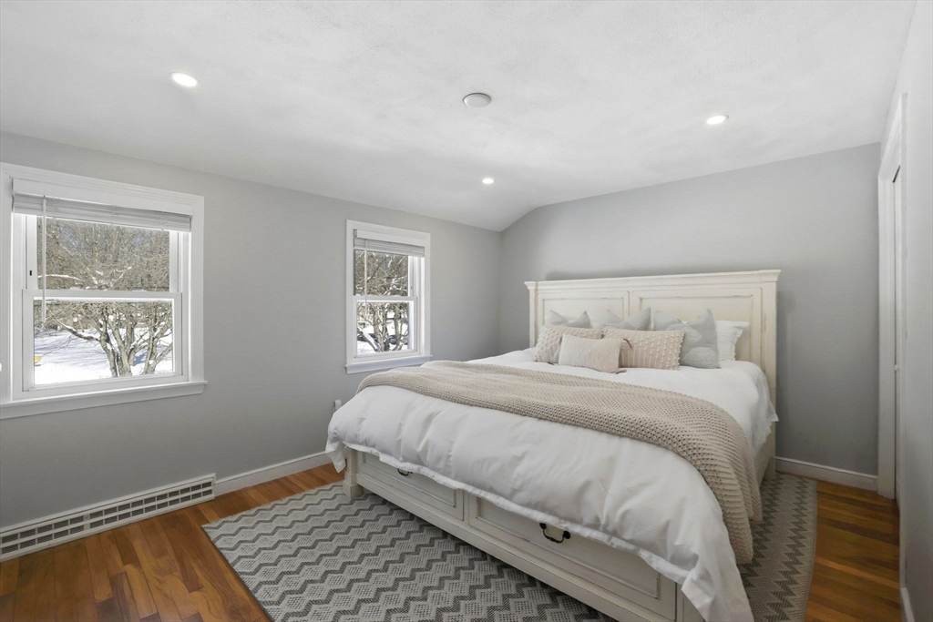 46 Brookwood Road Hanover, MA 02339 - Photo 22 of 41 a bedroom with a bed and a window