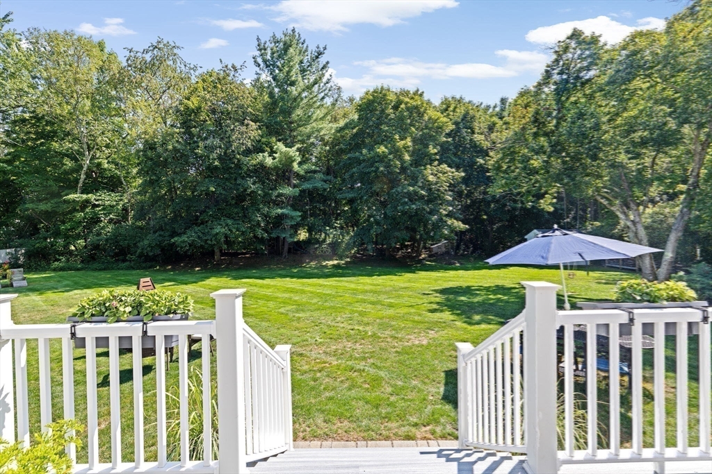 46 Brookwood Road Hanover, MA 02339 - Photo 32 of 41 a view of a deck with a garden and deck