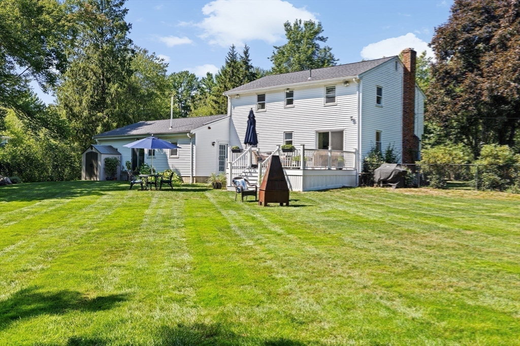 46 Brookwood Road Hanover, MA 02339 - Photo 33 of 41 a view of a house with pool and a yard