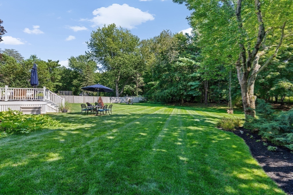 46 Brookwood Road Hanover, MA 02339 - Photo 34 of 41 a view of a house with a backyard