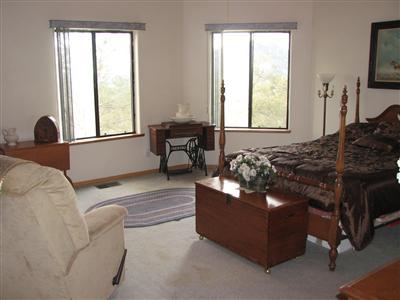 20164 Nicholas Road Prather, CA 93651 - Photo 28 of 67 Super large downstairs bedroom with awesome views from every window