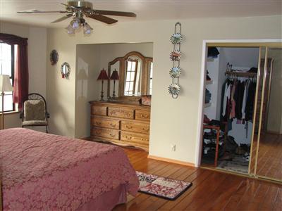 20164 Nicholas Road Prather, CA 93651 - Photo 37 of 67 Master bedroom upstairs with beautiful wood floors