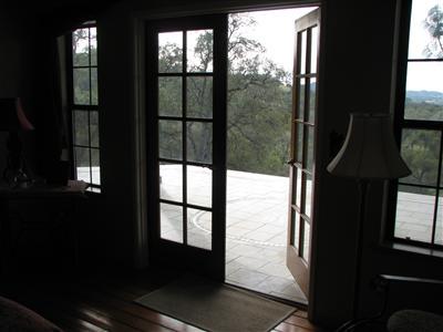 20164 Nicholas Road Prather, CA 93651 - Photo 38 of 67 French doors to outside patio with city lights views