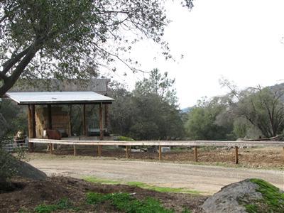 20164 Nicholas Road Prather, CA 93651 - Photo 66 of 67 Looking back from driveway towards the barn and corrals