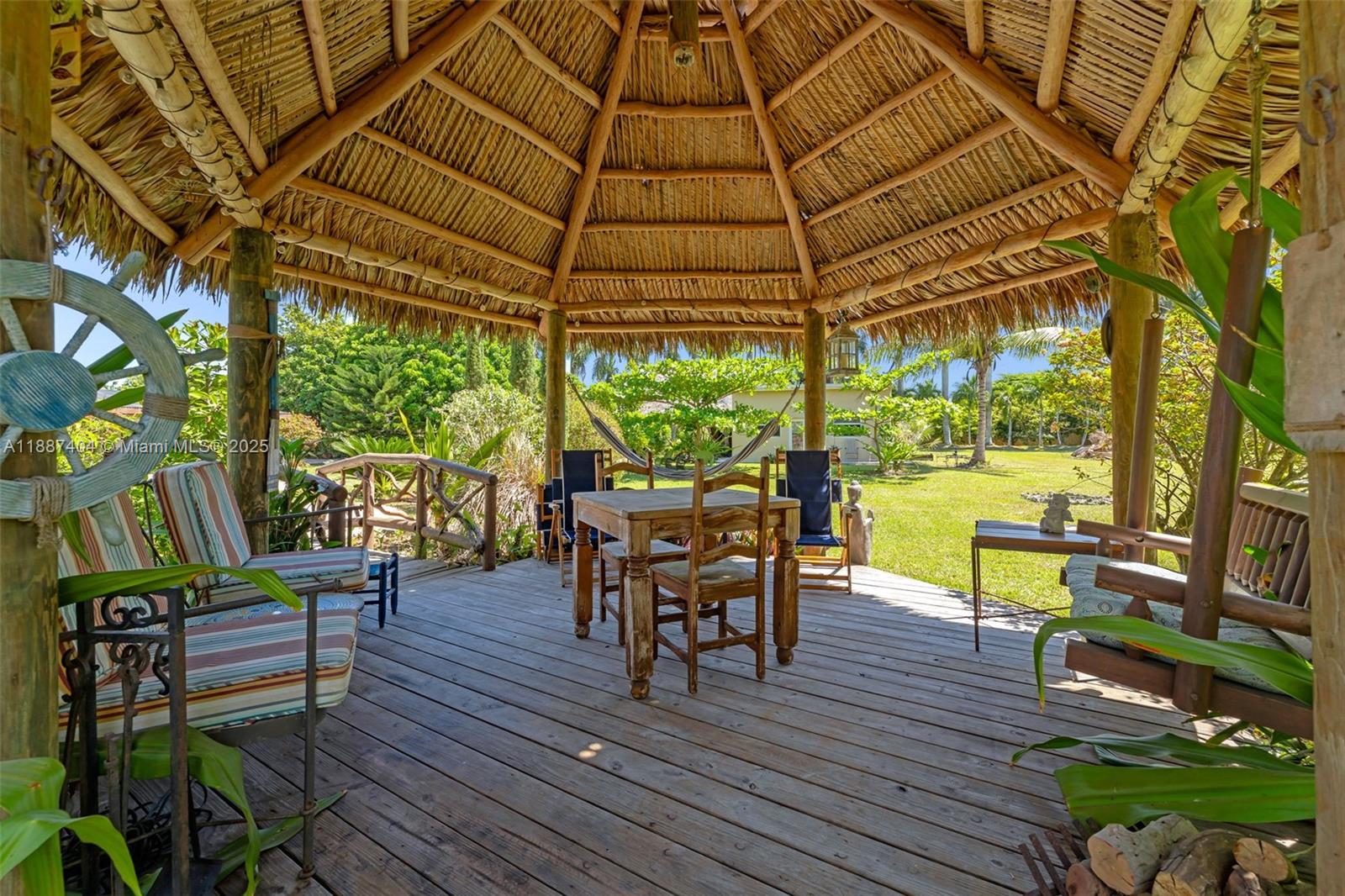 20230 Southwest 184th Street Miami, FL 33187 - Photo 26 of 42 One of 2 tiki huts. This is the tiki adjacent to pool.
