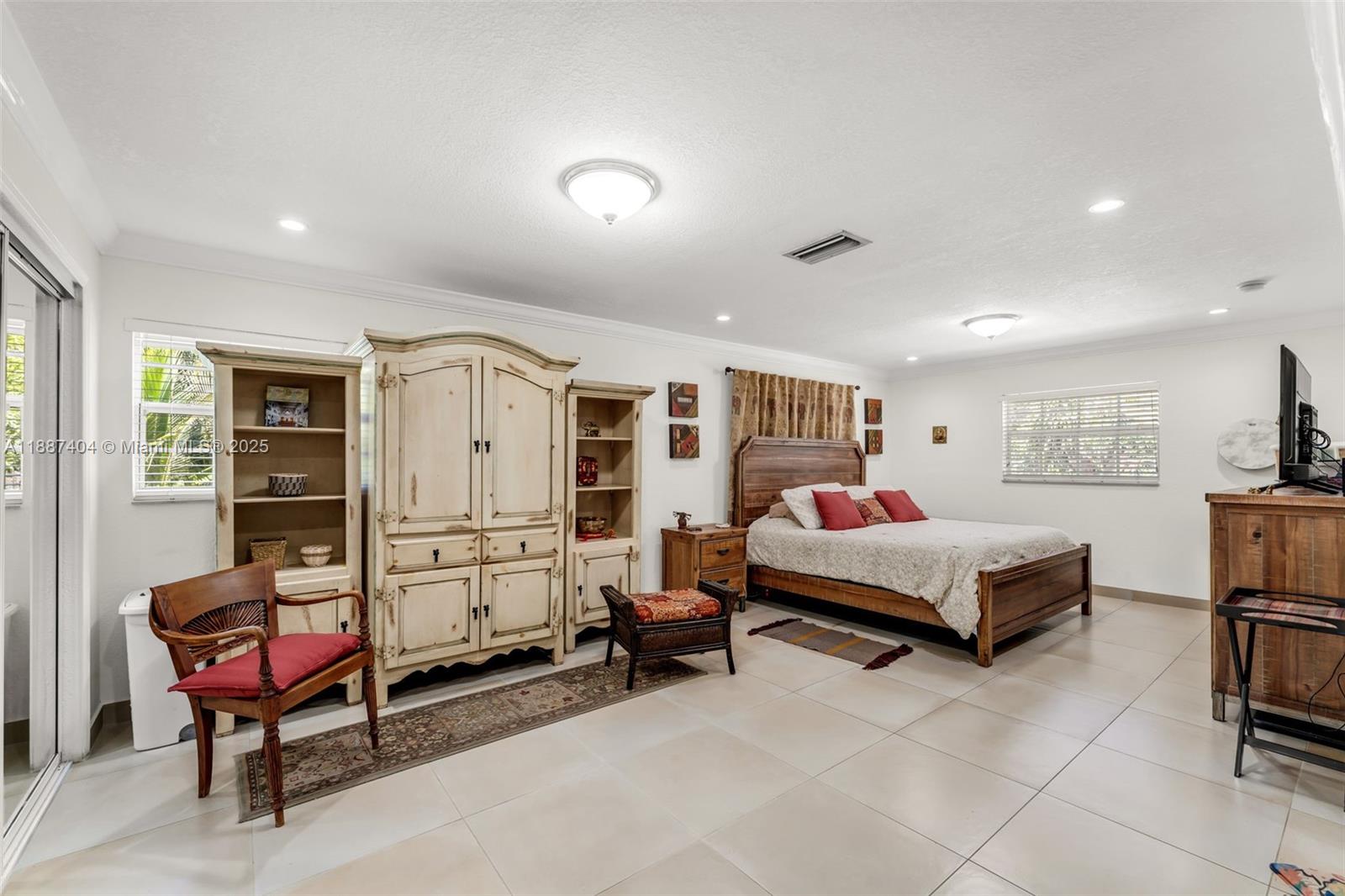 20230 Southwest 184th Street Miami, FL 33187 - Photo 10 of 42 #1 Primary suite w/ sitting area oversized & cozy