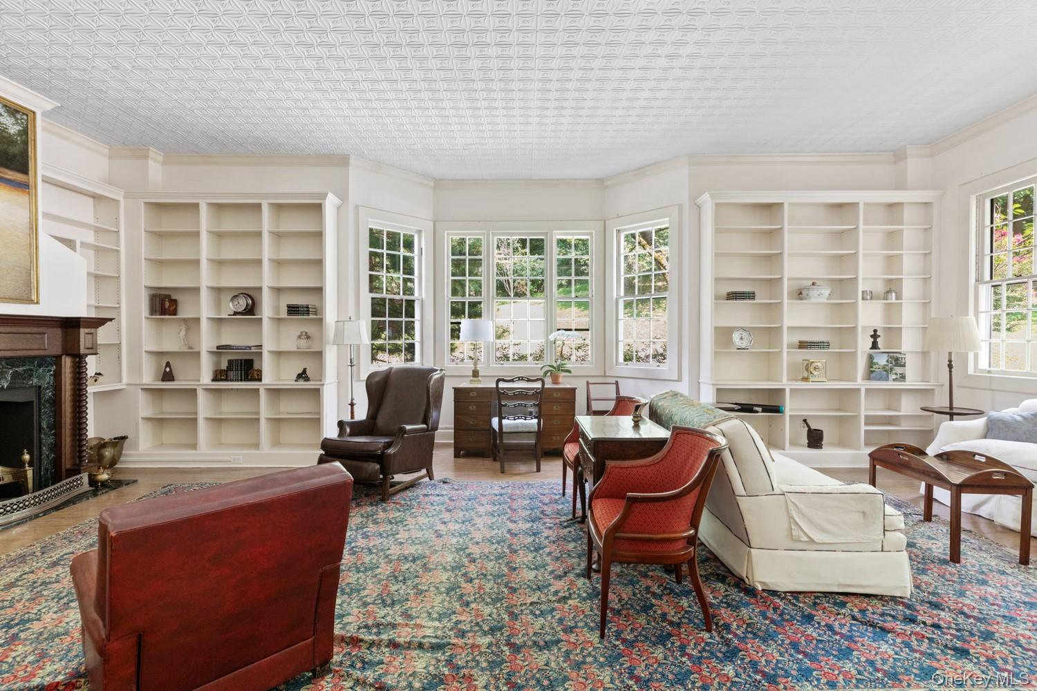 62 Cove Neck Road Cove Neck, NY 11771 - Photo 7 of 25 Library with Pocket Doors and Fireplace