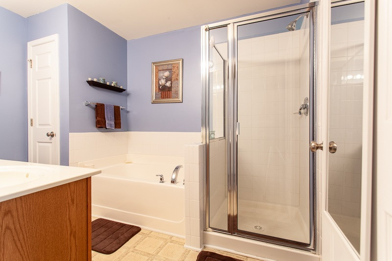351 Gilman Lane, Unit 102 Raleigh, NC 27610 - Photo 15 of 18 Large master bath with linen closet. You oasis from a long day at work. You can enjoy a nice candle lit bath and a book or a hot shower to wash away the weight of the day. Master Bath