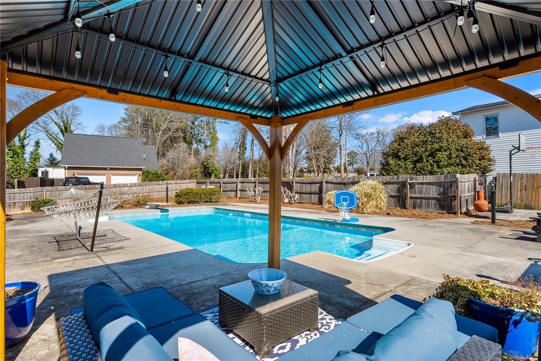 112 C-10-220 Anderson, SC 29621 - Photo 39 of 45 This private outdoor oasis offers a refreshing pool, perfect for relaxation or recreation.