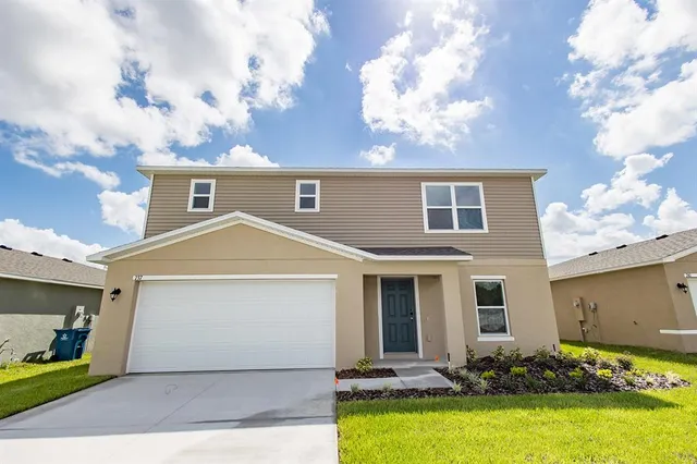 a front view of house with yard