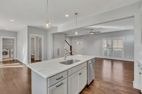 a bathroom with a sink double vanity and a mirror