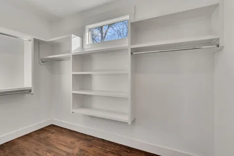 a view of an empty walk in closet