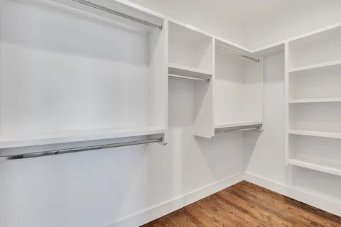 a view of an empty walk in closet