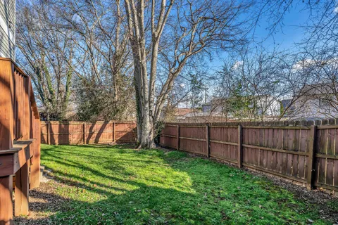 a view of backyard with green space