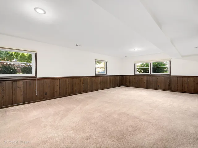 an empty room with a large window