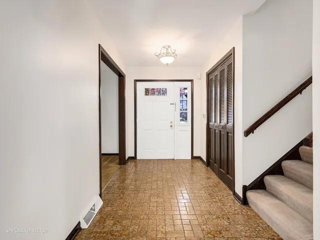 a view of a hallway with entryway