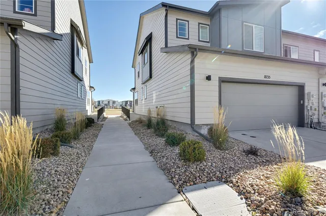 a view of a back yard of the house