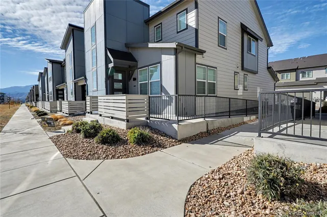 a view of a house with a street