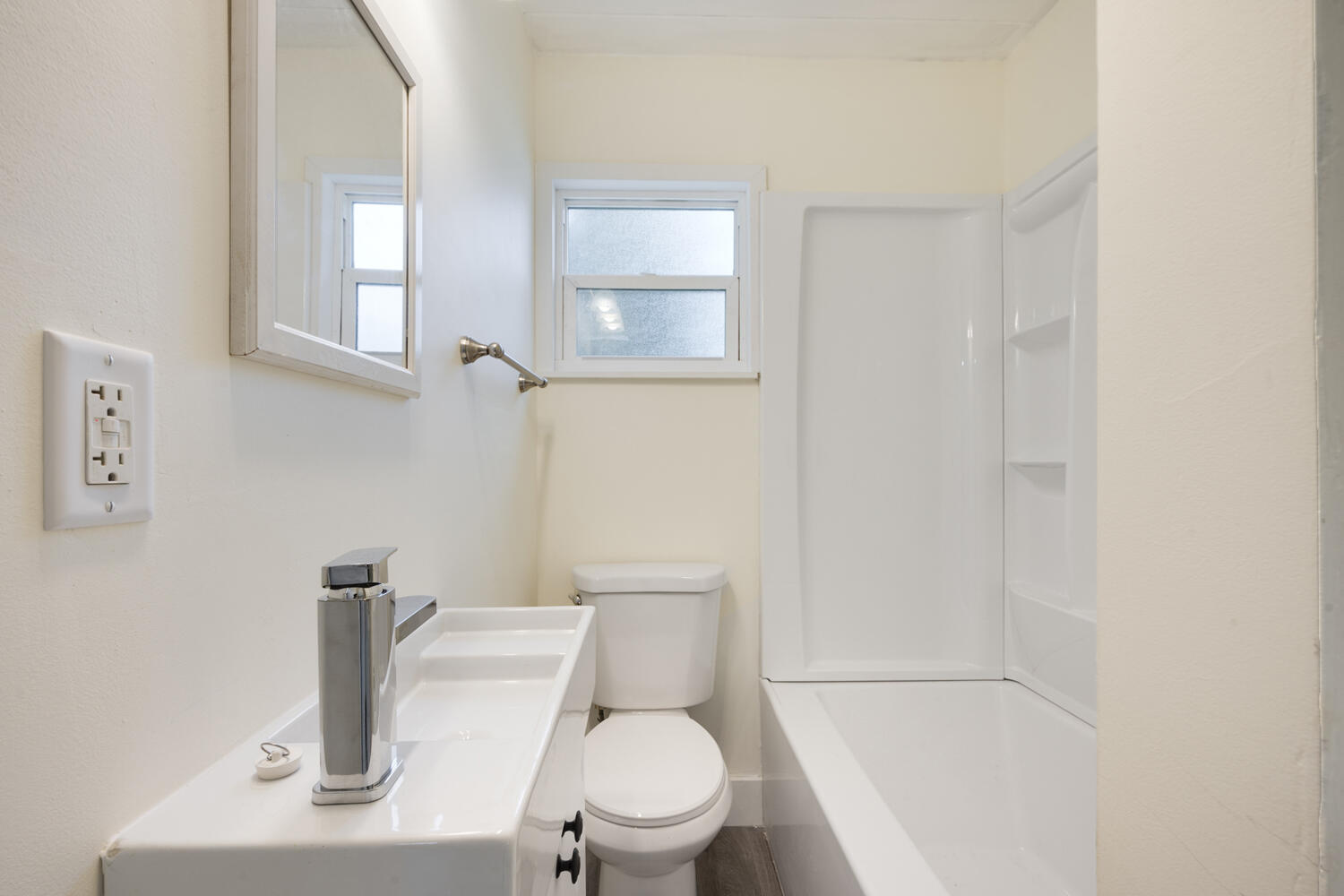 5331 Southeast Ebbtide Avenue Stuart, FL 34997 - Photo 10 of 24 a bathroom with a toilet a sink and mirror