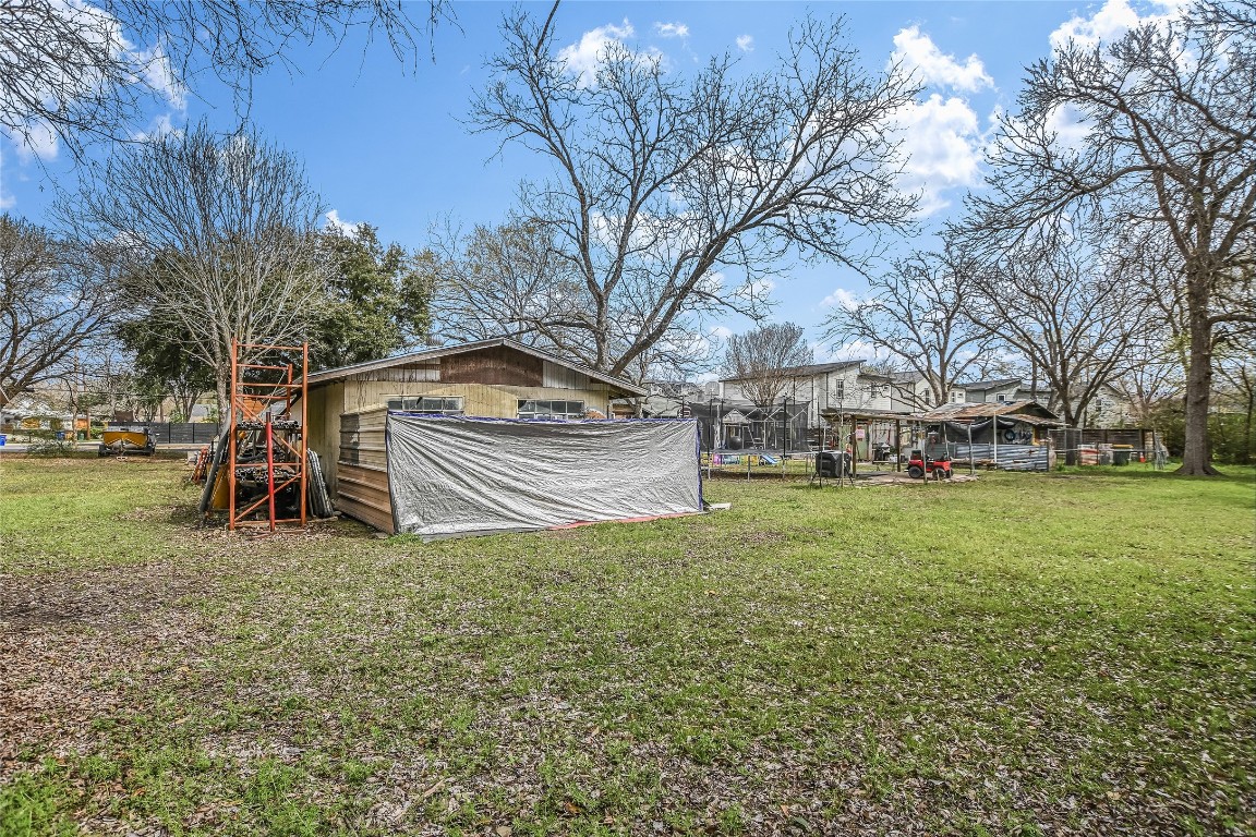 5405 Prock Lane Austin, TX 78721 - Photo 11 of 13 a view of a house with a back yard