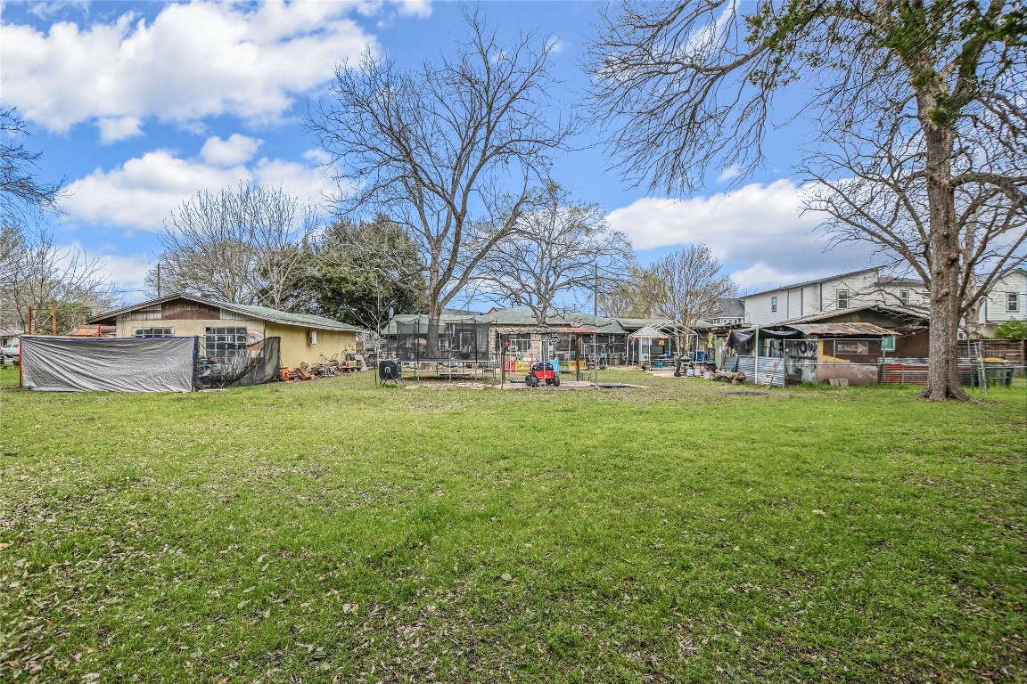 5405 Prock Lane Austin, TX 78721 - Photo 12 of 13 a view of an house with backyard space and balcony