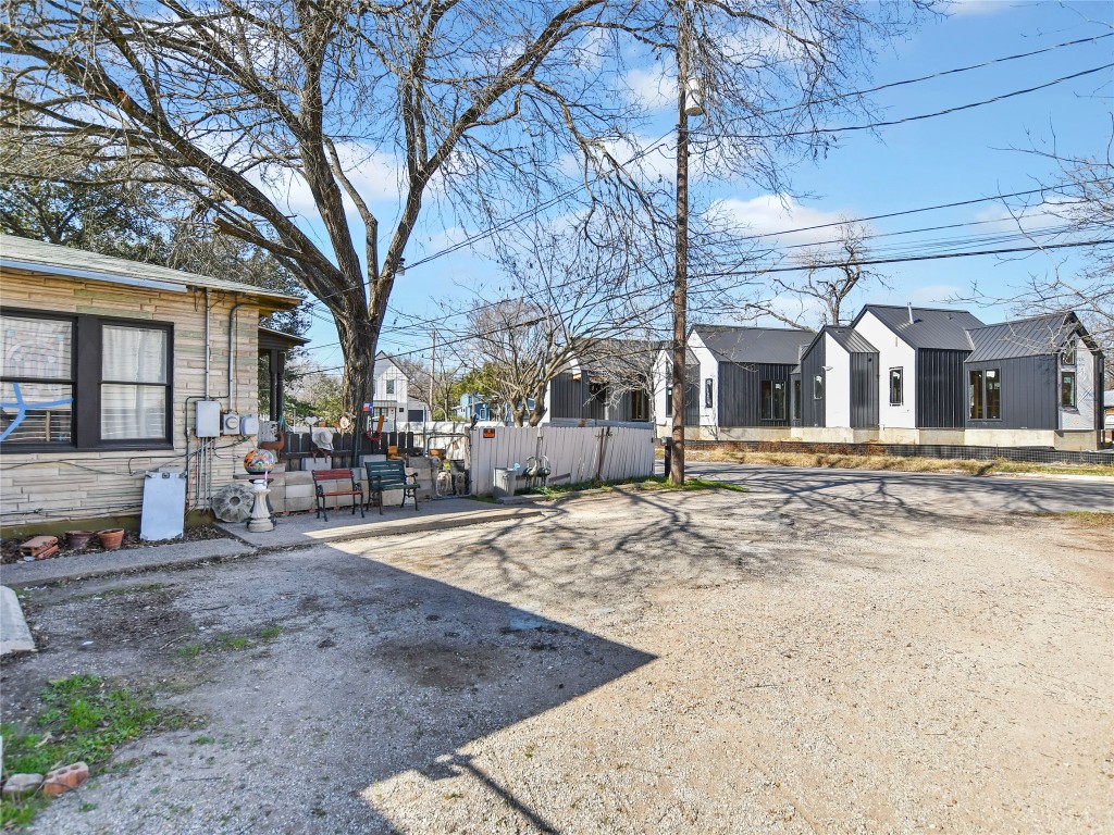 5405 Prock Lane Austin, TX 78721 - Photo 9 of 13 a view of a house with snow on the road