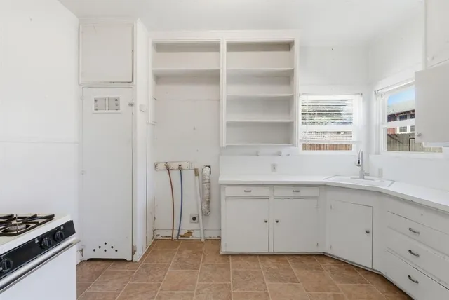 a view with cabinets and window