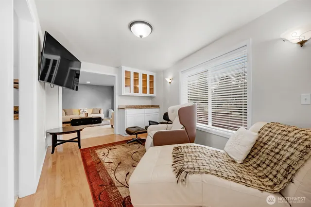 a bathroom with a tub a sink double and a mirror
