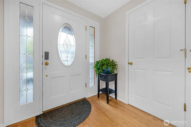 a view of a livingroom with furniture and wooden floor