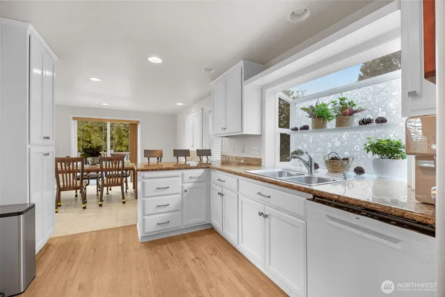 a kitchen with a stove and a microwave