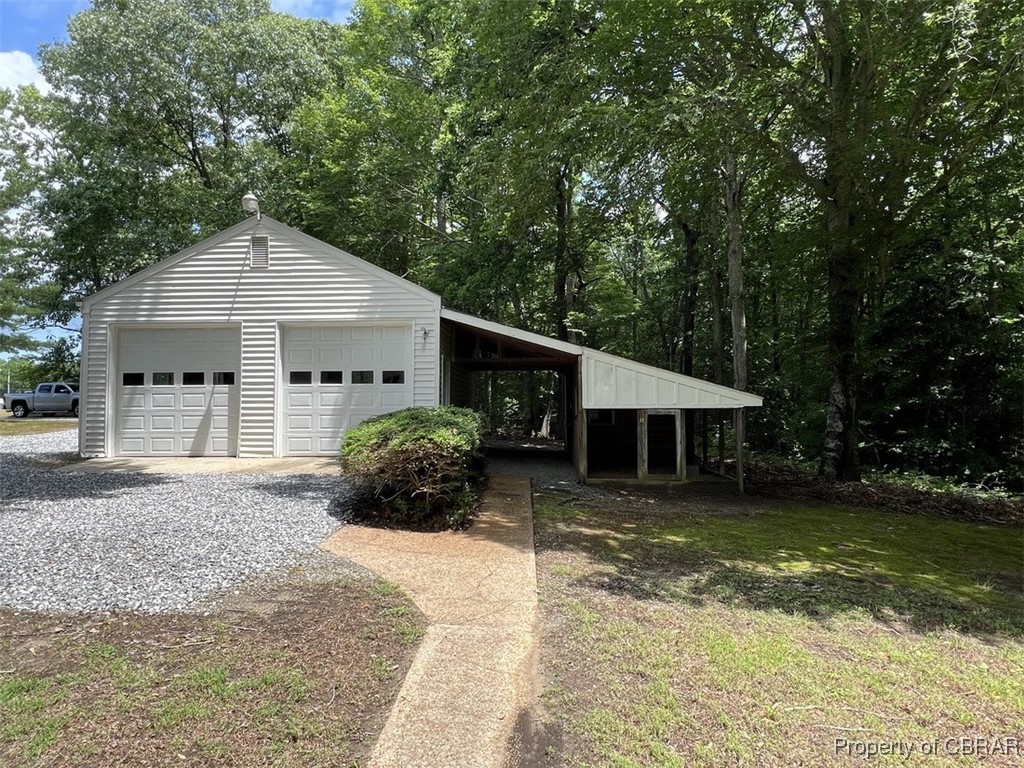 398 Philpot Road Locust Hill, VA 23092 - Photo 5 of 17 Detached garage with lean-to