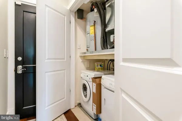 an outdoor space with furniture and city view