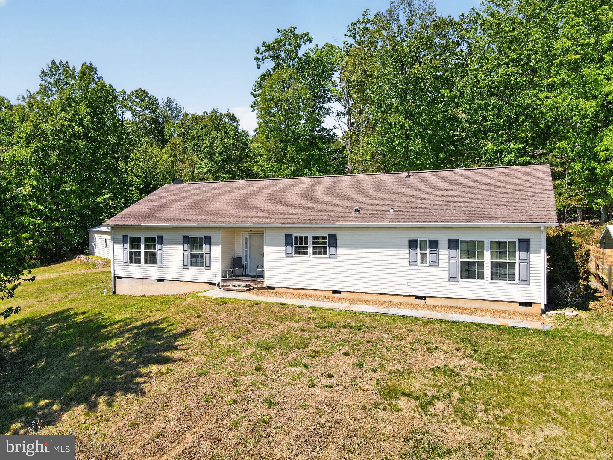 178 Lizzie Mills Road Castleton, VA 22716 - Photo 15 of 40 a front view of a house with a yard