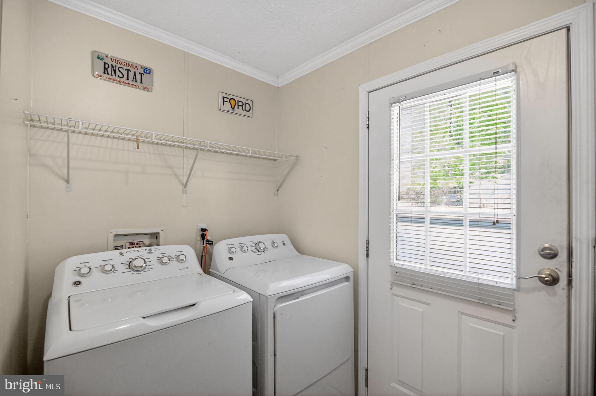 178 Lizzie Mills Road Castleton, VA 22716 - Photo 39 of 40 a view of storage and utility room with washer and dryer