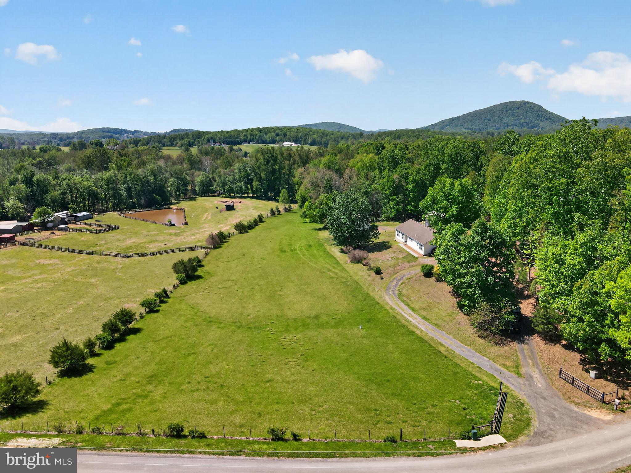 178 Lizzie Mills Road Castleton, VA 22716 - Photo 5 of 40 a view of a swimming pool with a yard