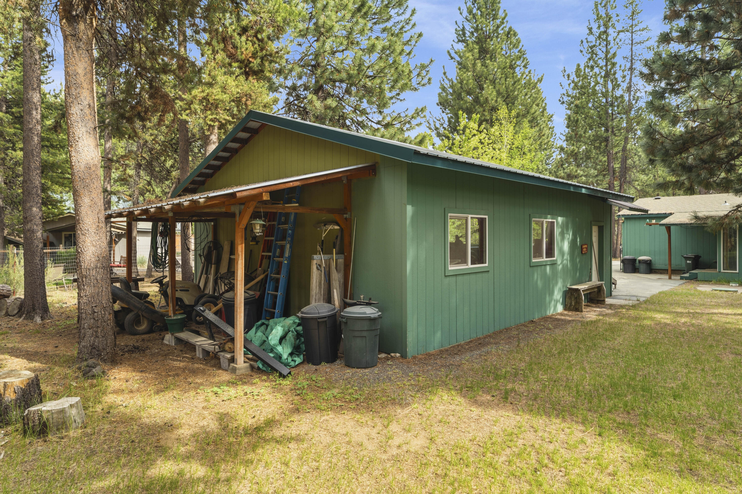 16928 Covina Road Bend, OR 97707 - Photo 33 of 48 a view of a house with backyard porch and sitting area