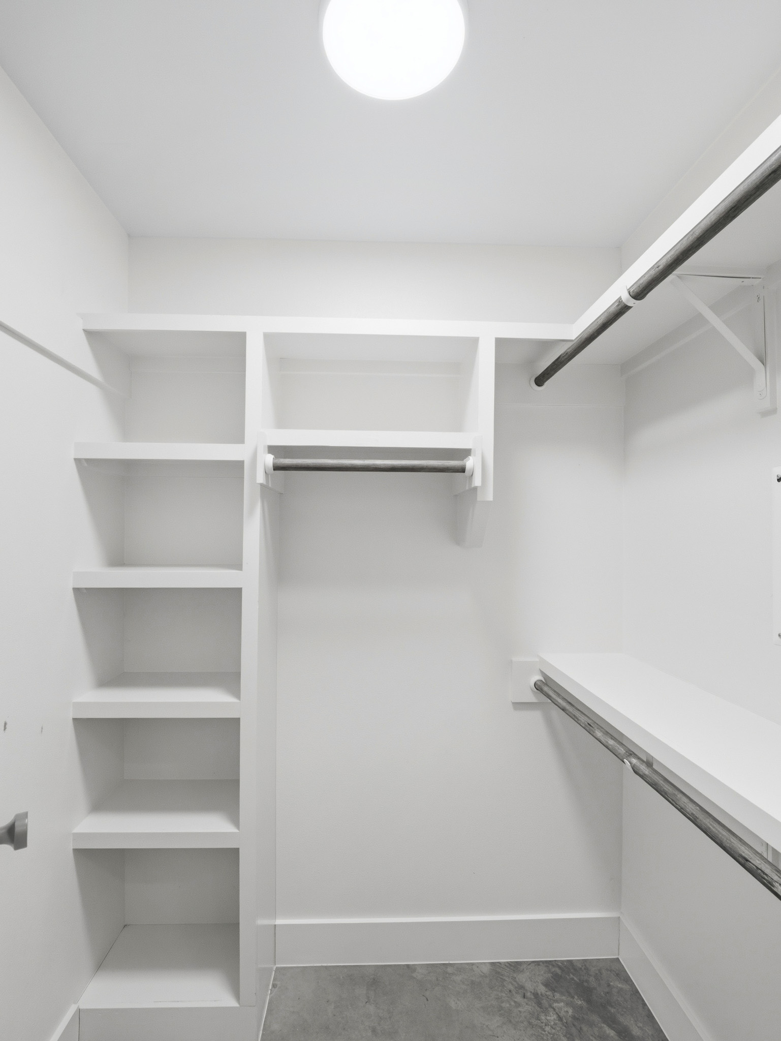 5005 Lott Avenue, Unit 2 Austin, TX 78721 - Photo 13 of 25 Ample shelving and hanging space defines this well-organized closet.