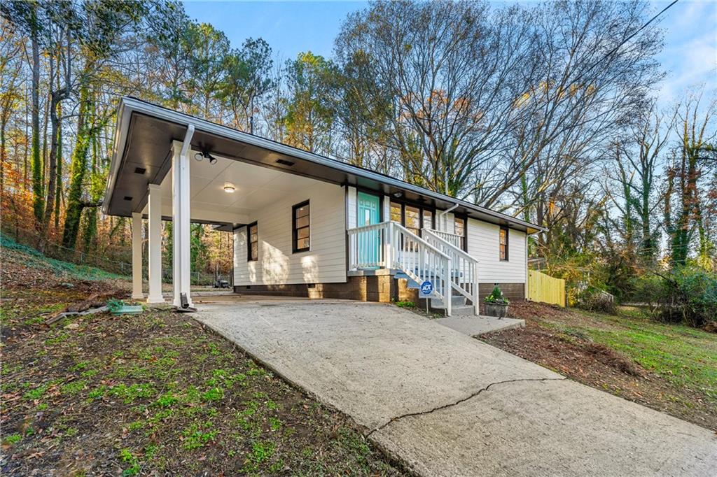 2903 Akron Street East Point, GA 30344 - Photo 2 of 14 a view of a house with a patio