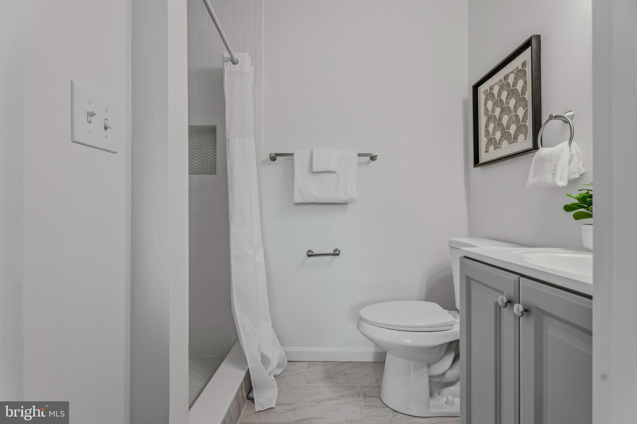 10604 Partridge Lane, Unit C3 Cockeysville, MD 21030 - Photo 16 of 23 a bathroom with a toilet and a sink