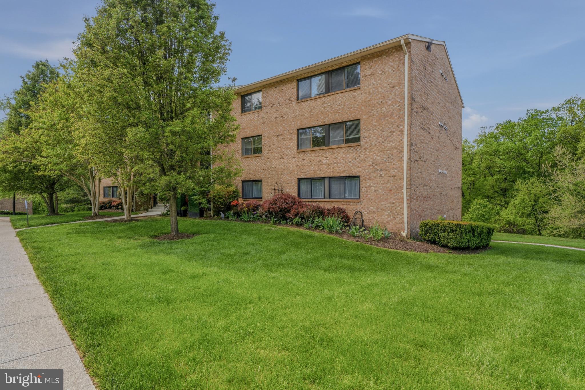 10604 Partridge Lane, Unit C3 Cockeysville, MD 21030 - Photo 22 of 23 a front view of house with a garden