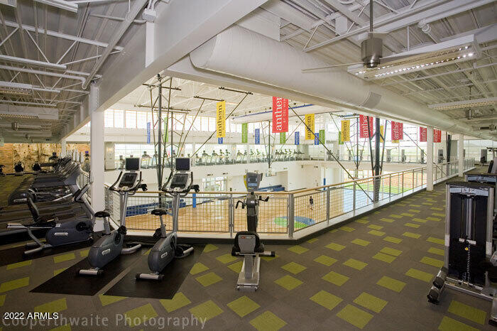 6694 West Ripken Way Florence, AZ 85132 - Photo 28 of 37 a room with lots of gym equipment