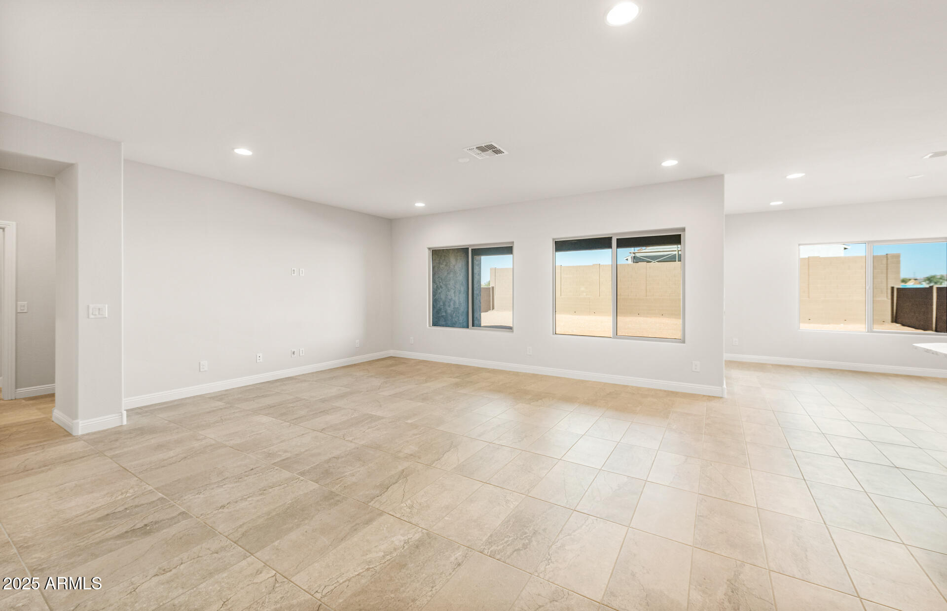 6694 West Ripken Way Florence, AZ 85132 - Photo 8 of 37 a view of an empty room with a window