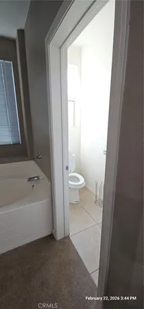 a bathroom with a double vanity sink and mirror
