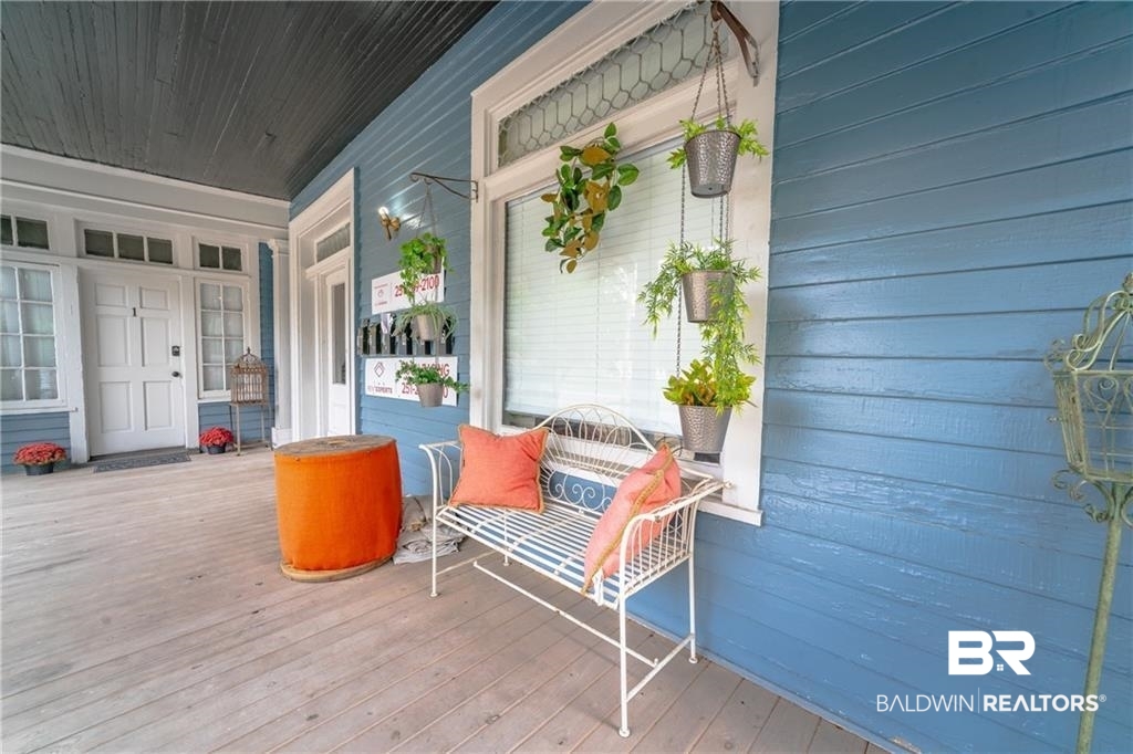207 Michigan Avenue Mobile, AL 36604 - Photo 8 of 31 View of wooden porch