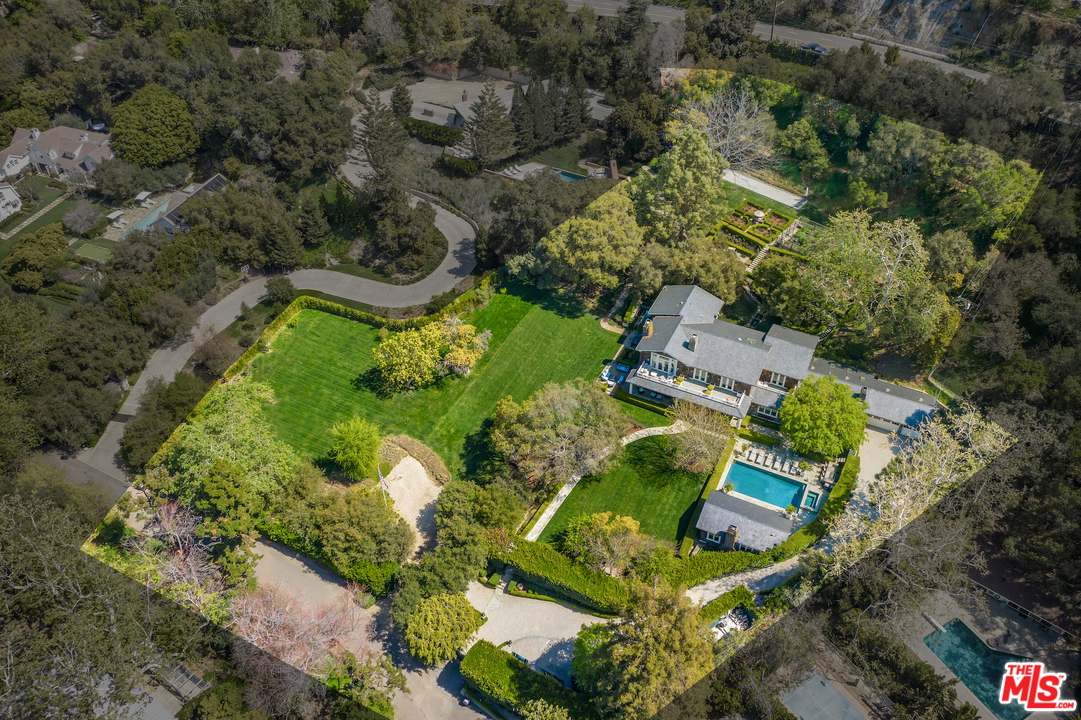 14100 Rustic Lane Pacific Palisades, CA 90272 - Photo 2 of 46 an aerial view of a house with a yard basket ball court and outdoor seating