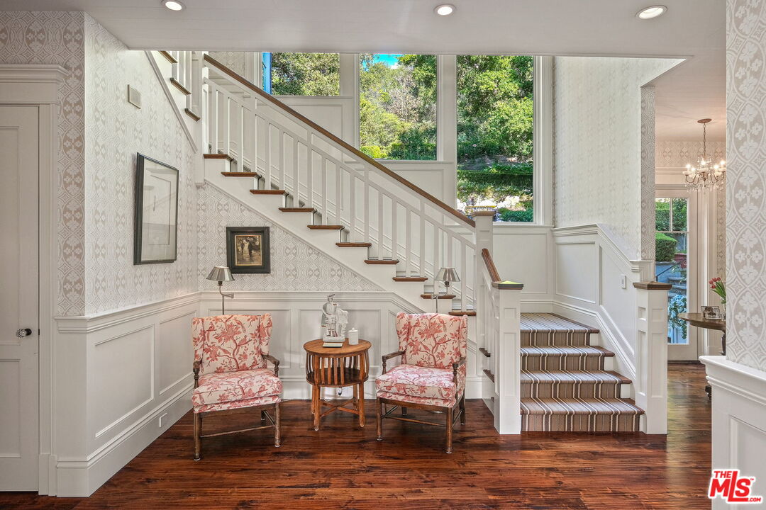 14100 Rustic Lane Pacific Palisades, CA 90272 - Photo 21 of 46 a view of entryway and hall with wooden floor